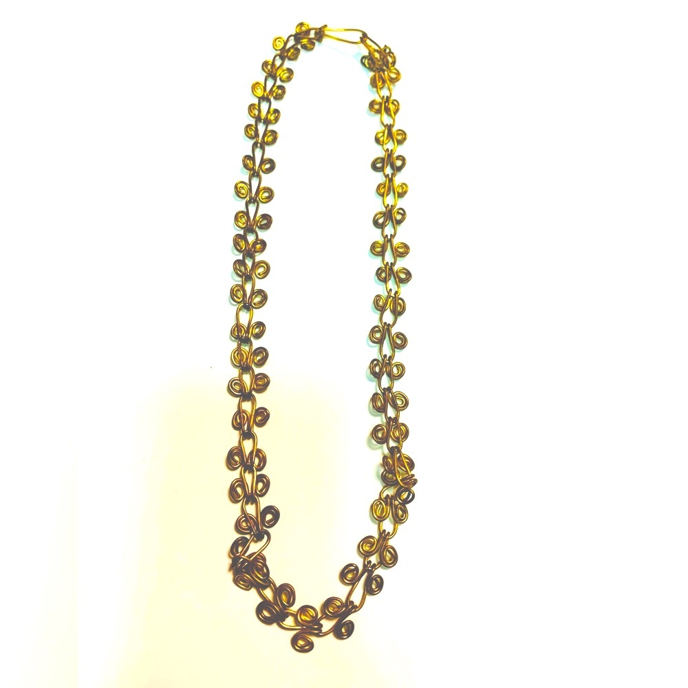Gold tone swirl patterned Necklace jewelry